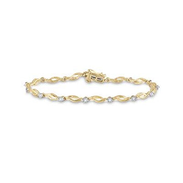 Gold chain bracelet features a delicate twisted design accented with sparkling diamonds.