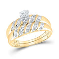 Gold diamond bridal set with round-cut center stone and swirling pave bands.