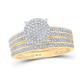 Gold ring featuring a round diamond cluster centerpiece and three rows of pave-set diamonds on the band.