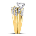 Gold band showcases sparkling diamond accents forming a chevron pattern and supporting a brilliant solitaire diamond.