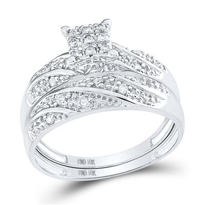 White gold diamond engagement ring and wedding band set with a swirling pave diamond design.