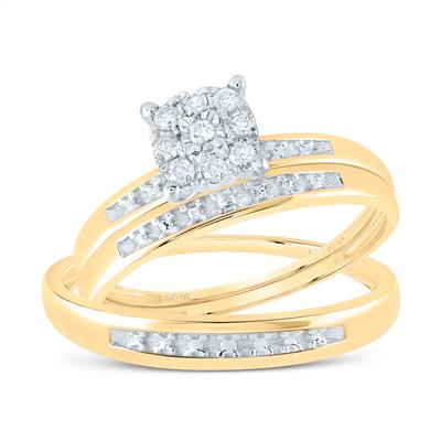 Gold engagement ring with a cluster of round diamonds and diamond accents on a white background.