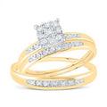 Gold engagement ring with a cluster of round diamonds and diamond accents on a white background.