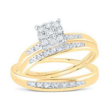 Gold engagement ring with a cluster of round diamonds and diamond accents on a white background.
