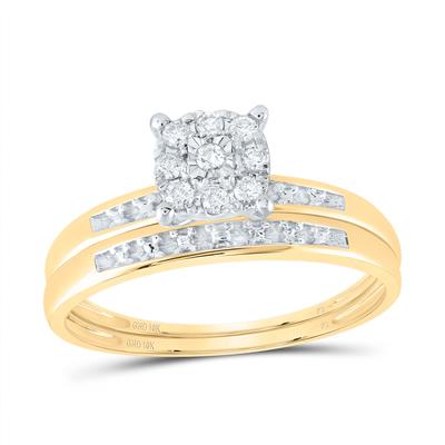Gold engagement ring with a cluster of round diamonds and diamond accents on a white background.